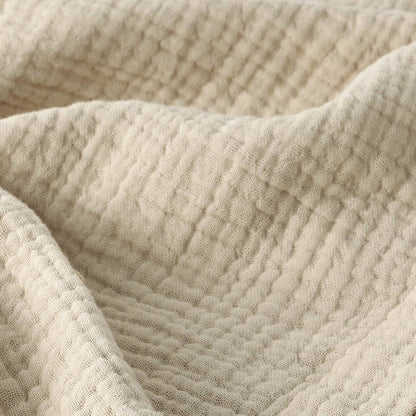 Close up of GentleSoft 100% cotton gauze blanket texture, showing breathable four-layer weave.