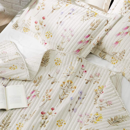 Autumn Wildflower Quilt Set, white bedding with delicate floral pattern and quilted detail.