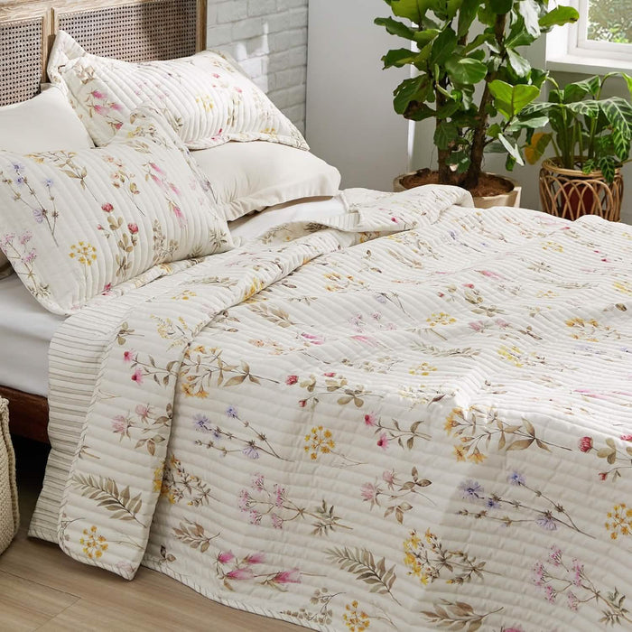 Autumn Wildflower Quilt Set with delicate floral pattern and horizontal quilting.