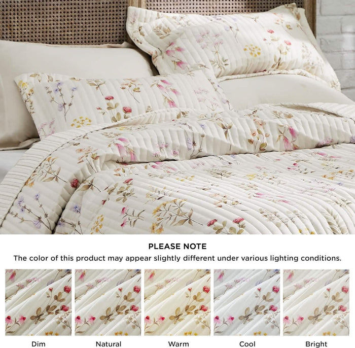 Autumn wildflower quilt set with delicate floral print and quilted texture on cream base.