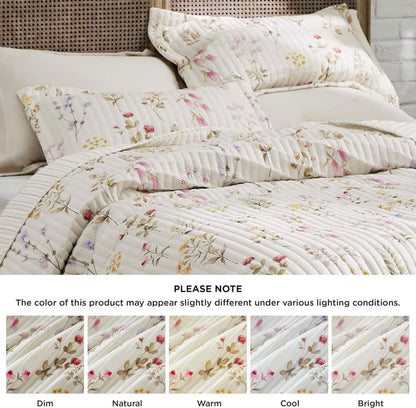 Autumn wildflower quilt set with delicate floral print and quilted texture on cream base.