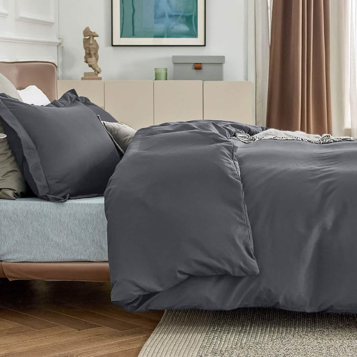 GentleSoft dark charcoal gray brushed microfiber duvet cover set with shams on a bed.
