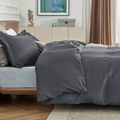 GentleSoft dark charcoal gray brushed microfiber duvet cover set with shams on a bed.