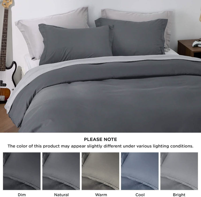 GentleSoft brushed microfiber duvet cover set in dark gray on a bed with light gray sheets and shams.