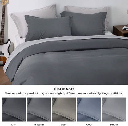 GentleSoft brushed microfiber duvet cover set in dark gray on a bed with light gray sheets and shams.