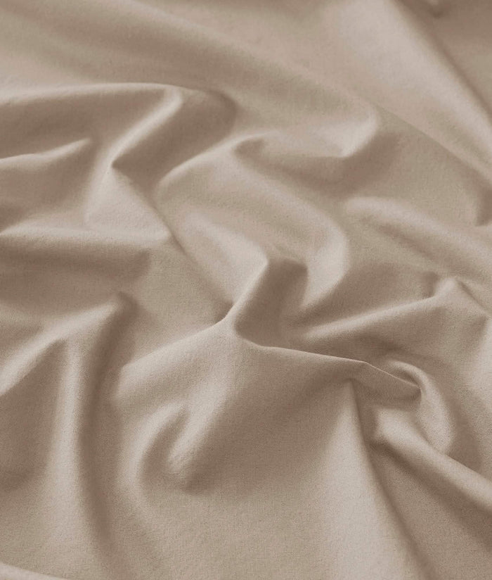 Close-up of taupe GentleSoft Cotton Percale fabric, showcasing its matte finish and soft texture.