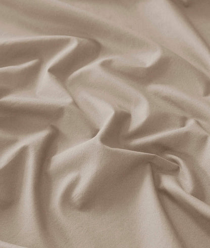 Close-up of taupe GentleSoft Cotton Percale fabric, showcasing its matte finish and soft texture.