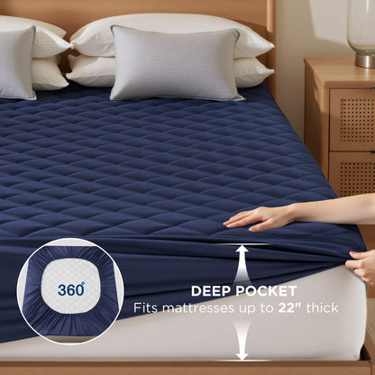 Navy diamond quilted waterproof mattress pad featuring 22 inch deep pocket fit.