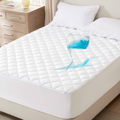 GentleSoft diamond quilted waterproof mattress pad resisting blue liquid spill on bed for spill protection.