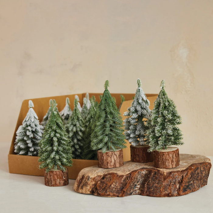 Evergreen Trees with Wood Slice Bases