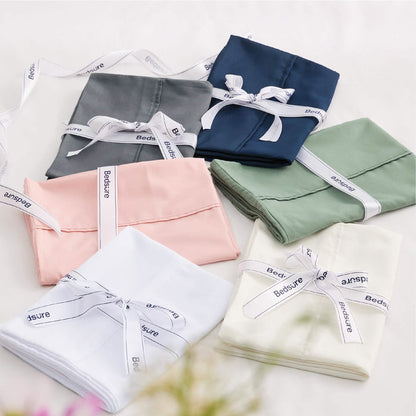 GentleSoft microfiber pillowcases in navy, grey, pink, sage green, white, cream. Tied with Bedsure ribbon. Packaging.