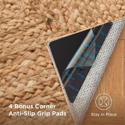 Tan faux cashmere jute-look area rug corner with anti-slip grip pad that helps it 'Stay in Place'.