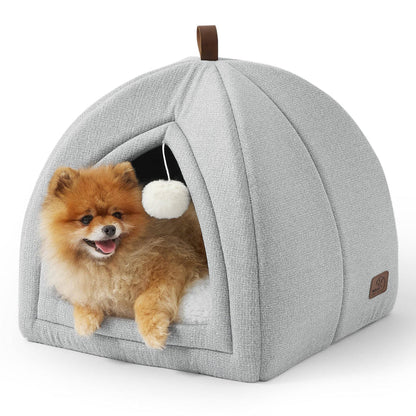 Light gray faux-linen cat dog tent with a Pomeranian peeking out, featuring a hanging pom-pom toy and leatherette handle.