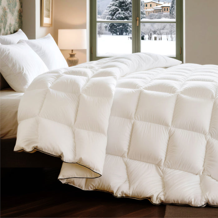 Plush PureWoven™ feather down comforter with box quilting and contrast black trim.