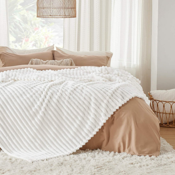 GentleSoft® off-white blanket with plush ribbed texture