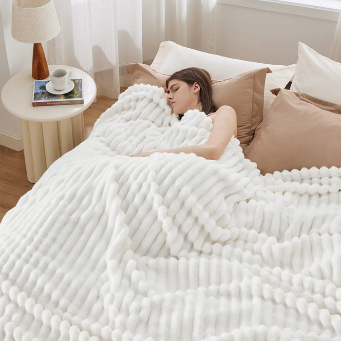 GentleSoft white fluffy blanket with soft ribbed texture for cozy luxury.
