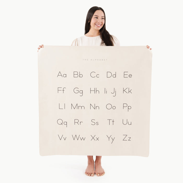 Alphabet@Woman holding the Alphabet Mini Mat
