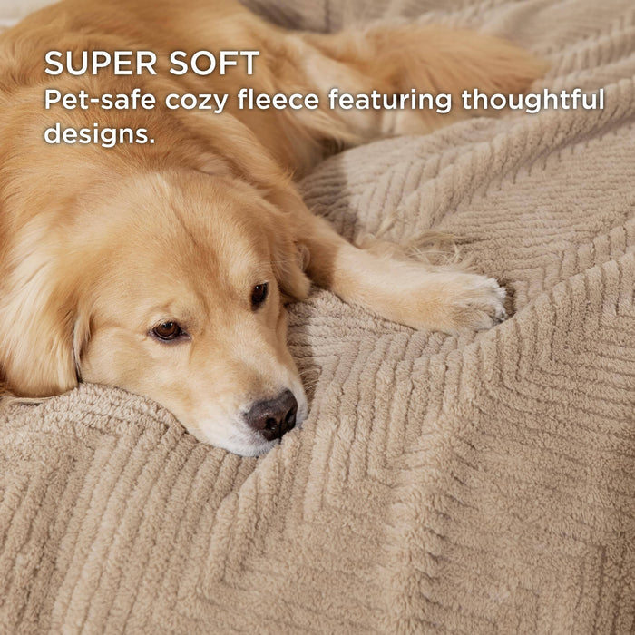Golden retriever relaxing on a light brown chevron Jacquard fleece pet blanket, highlighting its super soft and cozy texture.