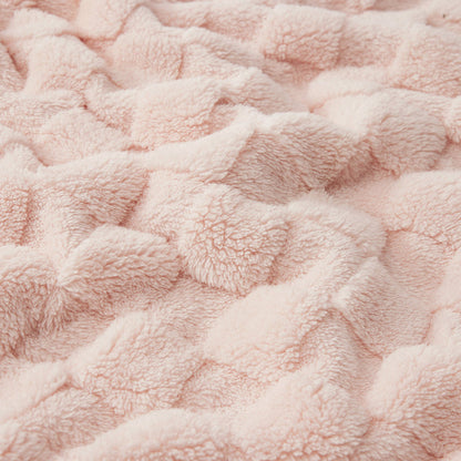 Close-up of pink GentleSoft sherpa blanket showing shaggy texture and checkerboard jacquard weave.