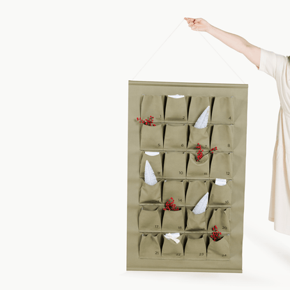 Fern (on sale)@Woman holding the Large Fern Advent Calendar