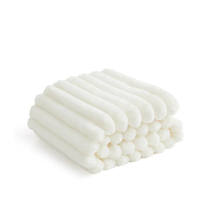 Luxplush cream blanket with wide, soft ribbed stripe texture for cozy comfort.