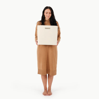 Ivory@woman holding medium storage bin
