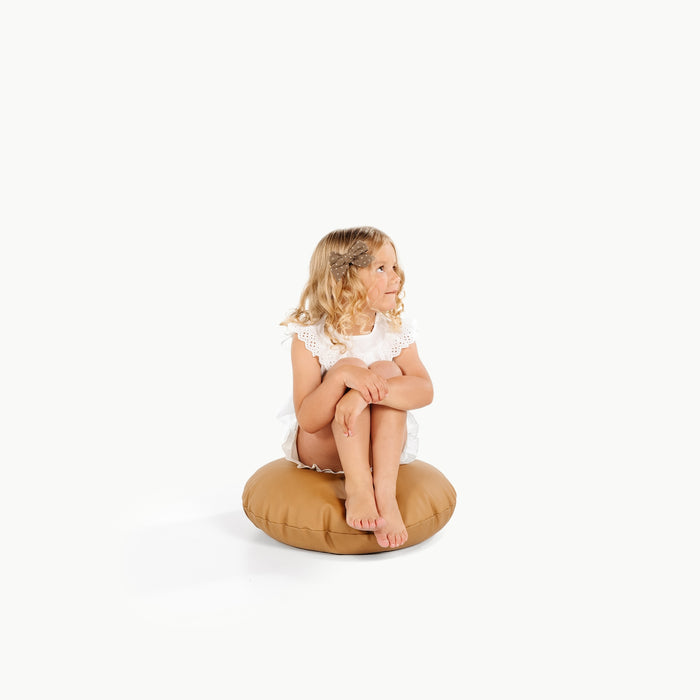 Camel / Circle@little girl sitting on the Camel Mini Circle Floor Cushion