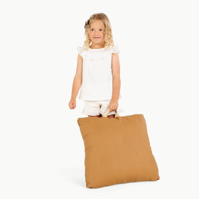 Camel / Square@Little Girl holding the Camel Mini Square Floor Cushion