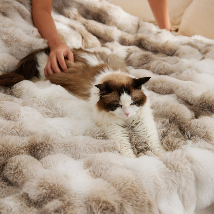 Oat Milk Bubble faux fur blanket with cat and hand, part of PureWoven plush bundle.