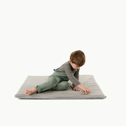 Stone Stripe / Square@Boy sitting on Stone Stripe Padded Mini Square
