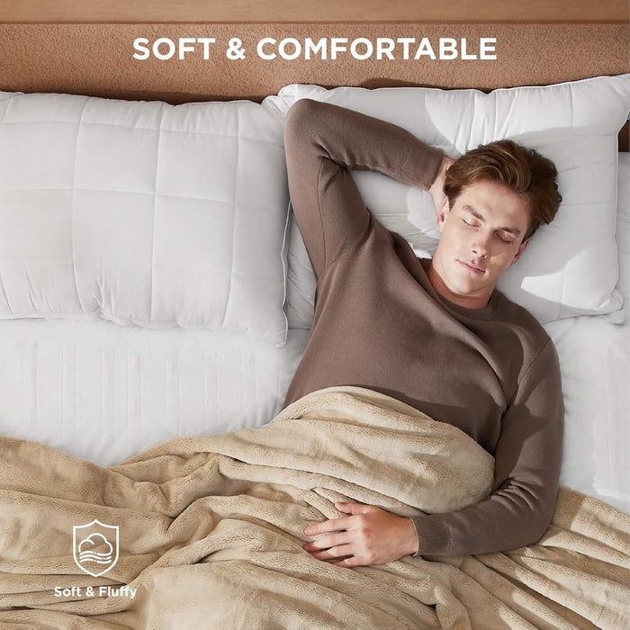 "SOFT & COMFORTABLE" text; man sleeping peacefully on soft bed with heated mattress pad.
