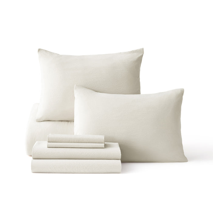 Prewashed down alternative bedding set: light beige textured polyester sheets & pillowcases.