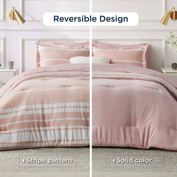 GentleSoft reversible bed-in-a-bag: split view of pink and white stripes on one side, solid pink on the other.