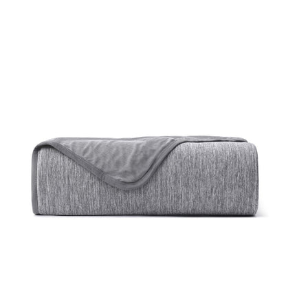 Folded gray GentleSoft cooling blanket with reversible textures, nylon material.