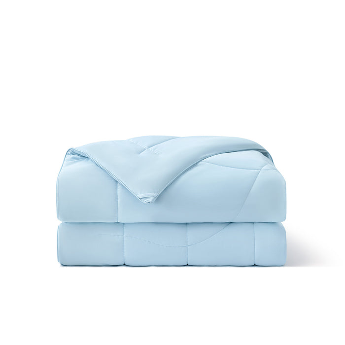 Light blue reversible cooling comforter with diamond quilting