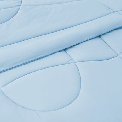 Silky soft light blue reversible cooling comforter with detailed quilting.