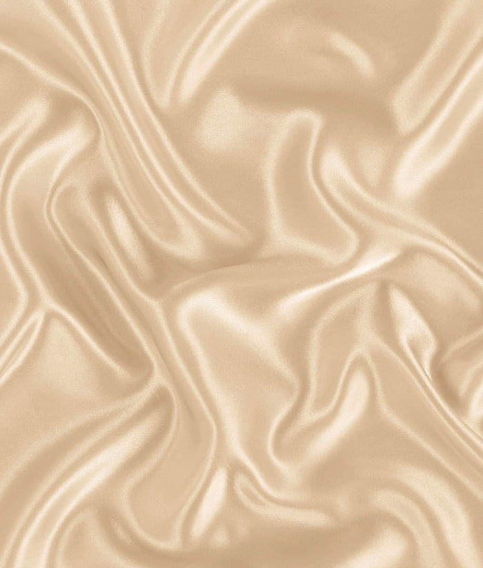 Close-up of gold satin body pillowcase fabric showing smooth, silky texture and elegant sheen.