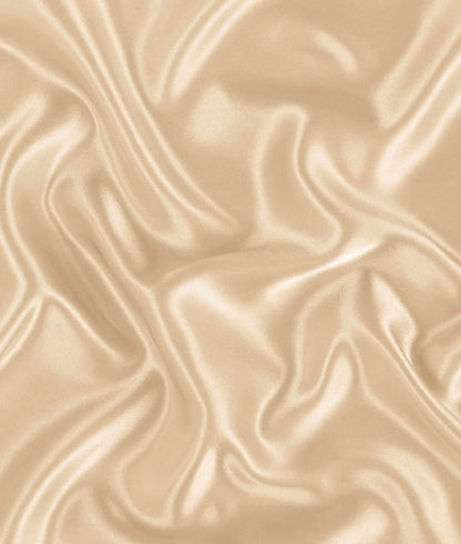 Close-up of gold satin body pillowcase fabric showing smooth, silky texture and elegant sheen.