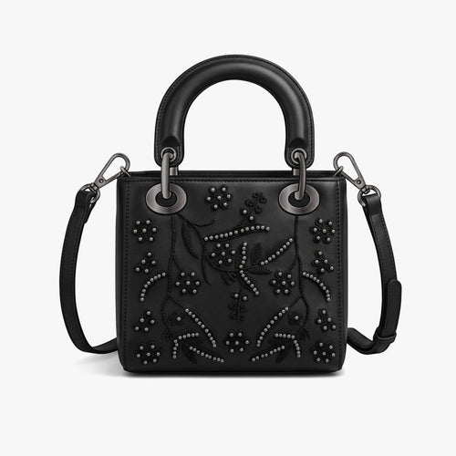Black Sissy Boy Emma handbag with ornate floral embroidery, studded details, a top handle, and detachable shoulder strap.