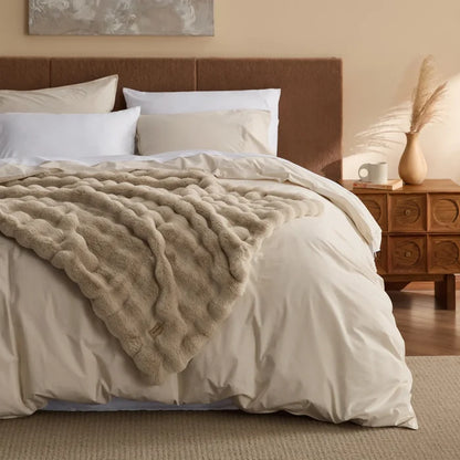 Slub Cotton Plush Luxe Bundle: Beige plush blanket on luxury bedding