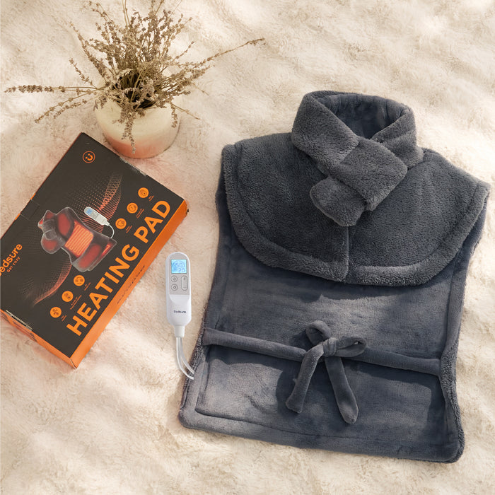 Dark grey plush smart heating pad for neck and shoulders, shown with its Bedsure box and controller.