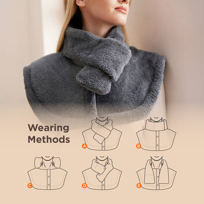Smart heating pad in grey faux cashmere, demonstrating 5 adjustable neck and shoulder wearing styles.