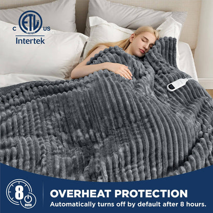 Woman sleeps under soft dark gray striped flannel heated blanket with ETL certification & overheat protection.
