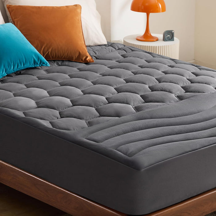 Grey three-zone quilted mattress pad with wave & honeycomb zones for pressure relief