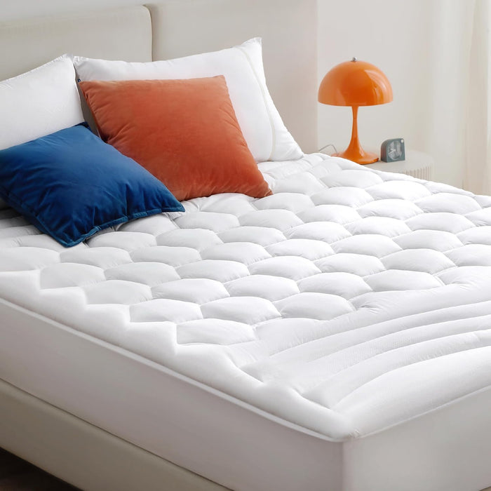 White Three-Zone Quilted Mattress Pad with pressure-relieving wave and honeycomb quilting.