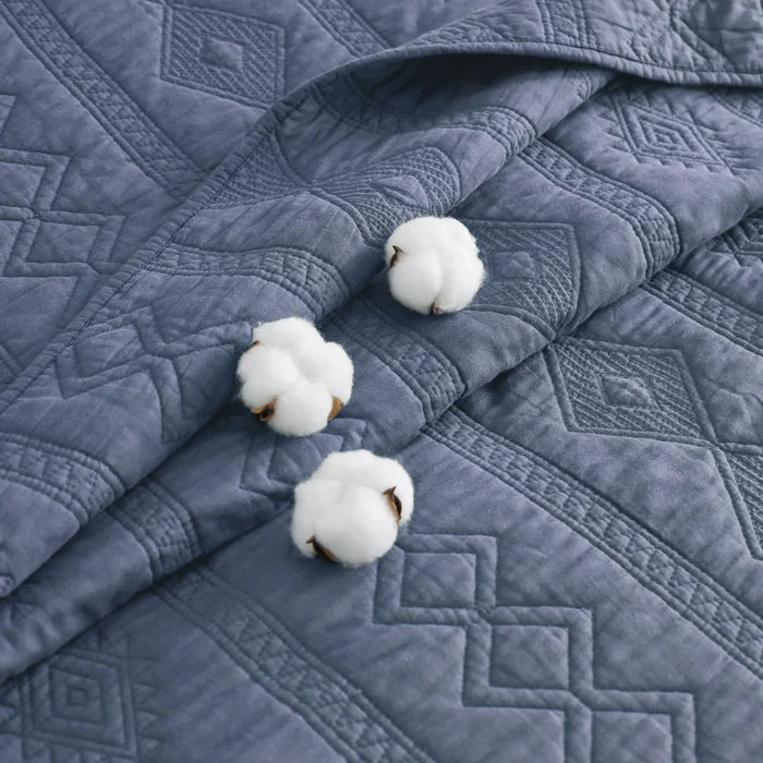 Blue diamond-quilted 100% cotton voile quilt set with decorative cotton bolls.