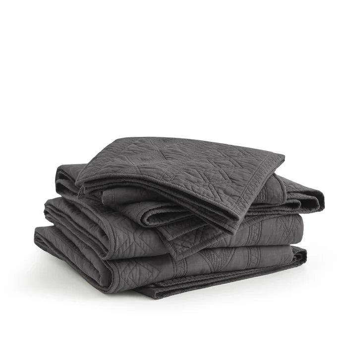 Dark grey Voile Cotton Quilt Set folded, displaying diamond quilting pattern.