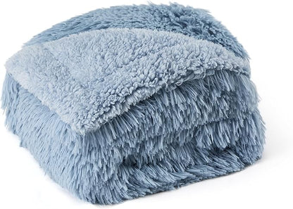 Plush light blue reversible waterproof pet blanket with shaggy faux fur and soft fleece textures, polyester material.