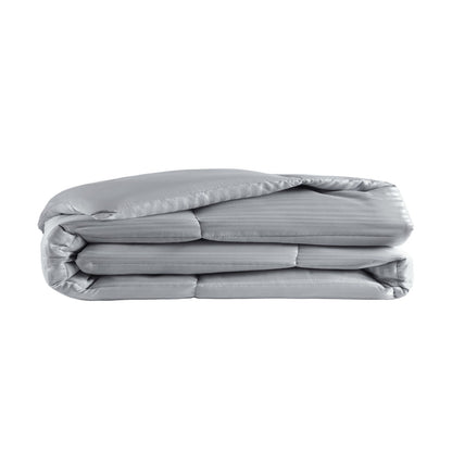 Weightless comfy grey striped quilt, neatly folded, showing box stitching and subtle pinstripe pattern.