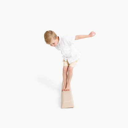 Millet@kid playing on the millet balance beam